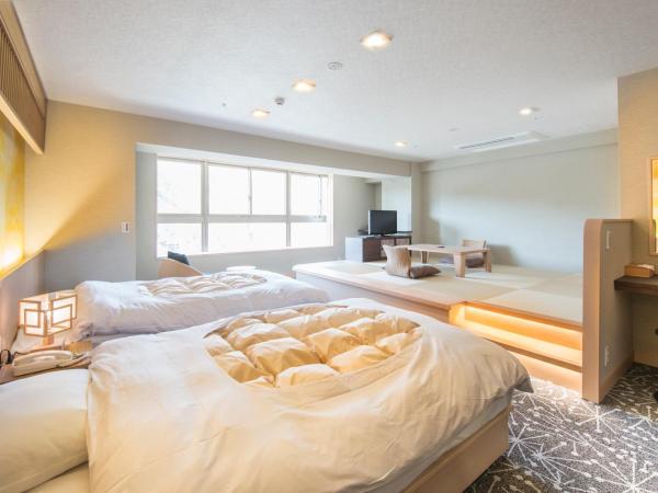 Ryokan Nenrinbo : photo 3 de la chambre chambre lits jumeaux rénovée avec coin tatami - nouveau bâtiment