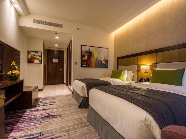 Golden Tulip Media Hotel : photo 2 de la chambre chambre lits jumeaux deluxe (transferts gratuits vers la plage et certains centres commerciaux - 20 % de réduction sur la nourriture et les boissons & spa)