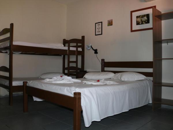 Pousada Flor Dália : photo 1 de la chambre suite familiale standard