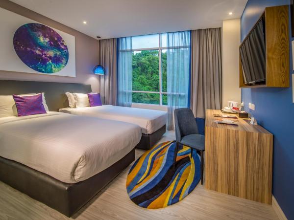 Mercure Kota Kinabalu City Centre : photo 2 de la chambre chambre lits jumeaux supérieure - vue sur jardin