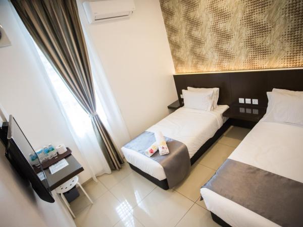 IM 96 Villa : photo 4 de la chambre chambre lits jumeaux deluxe