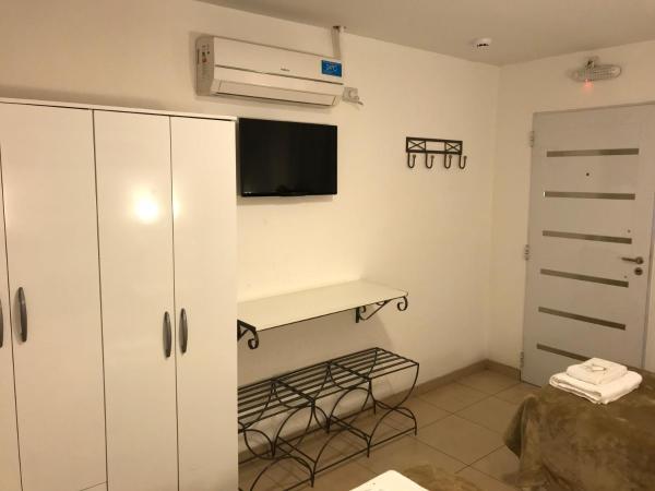 Faro del Parque : photo 2 de la chambre chambre triple avec salle de bains