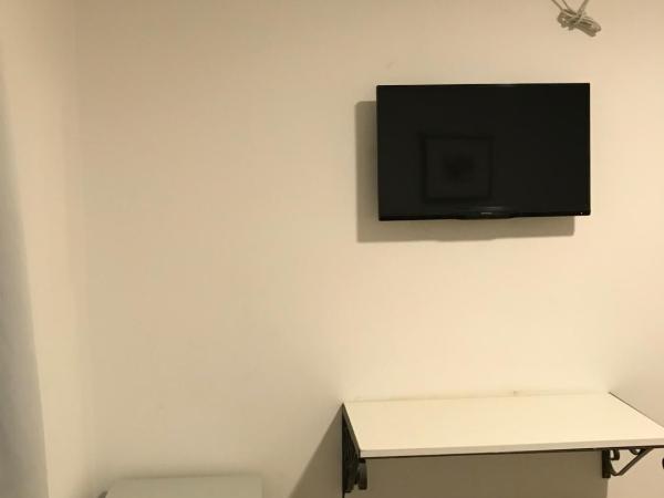 Faro del Parque : photo 4 de la chambre chambre lits jumeaux avec salle de bains