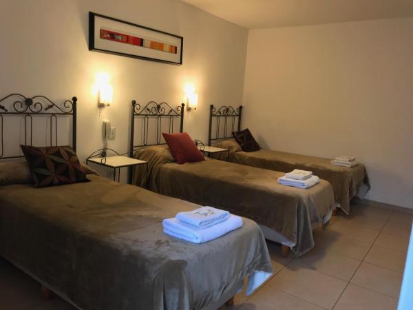 Faro del Parque : photo 1 de la chambre chambre triple avec salle de bains