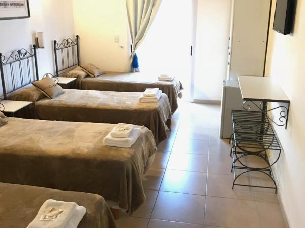 Faro del Parque : photo 4 de la chambre chambre quadruple