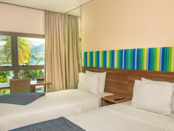 Prodigy Santos Dumont : photo 4 de la chambre chambre double supérieure - vue sur mer