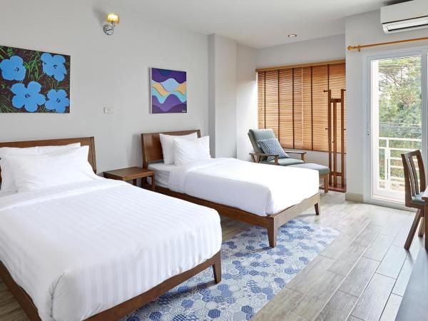 Chez Bure - Bure Homestay : photo 5 de la chambre chambre lits jumeaux supérieure