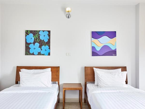 Chez Bure - Bure Homestay : photo 8 de la chambre chambre lits jumeaux supérieure