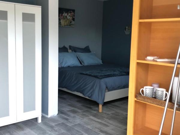 Le clos des vergers : photo 6 de la chambre chambre deluxe (2 adultes + 1 enfant)