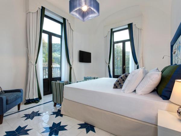 Anna Belle Elegant AgriResort : photo 2 de la chambre chambre double ou lits jumeaux supérieure - vue sur jardin - balcon