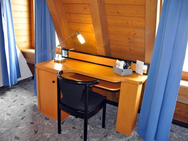 Villa Waldperlach by Blattl : photo 8 de la chambre studio lit king-size avec canapé-lit