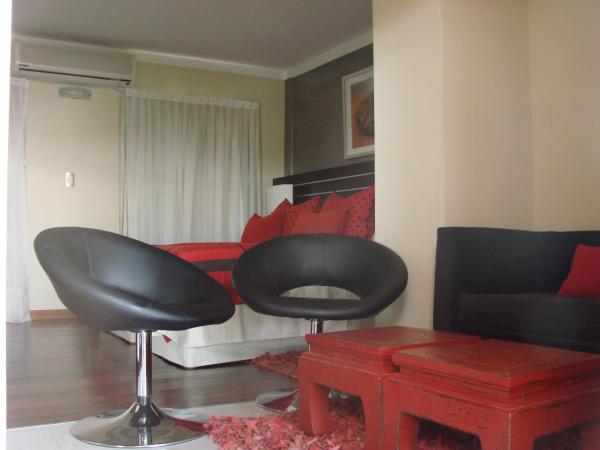 Zoom Apartments Hotel : photo 9 de la chambre suite lit king-size avec baignoire spa