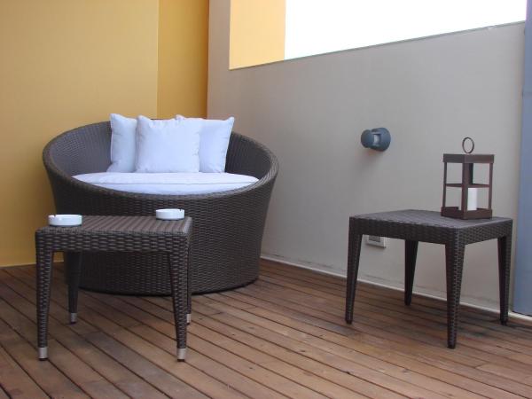 Zoom Apartments Hotel : photo 7 de la chambre suite lit king-size avec baignoire spa