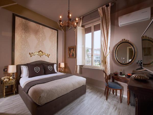 Villa Tower Inn : photo 8 de la chambre suite deluxe avec balcon