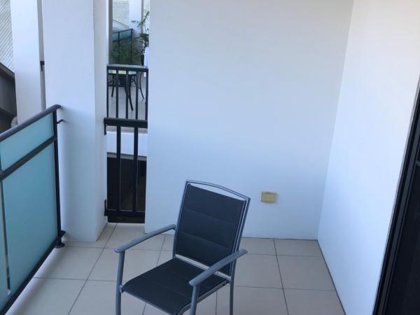 Elysium Apartments : photo 4 de la chambre petite chambre lit queen-size
