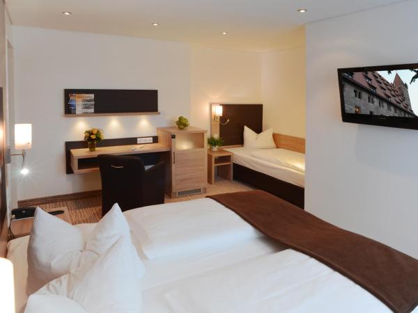 Ringhotel Loew's Merkur : photo 2 de la chambre chambre triple