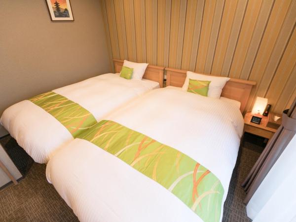 Stay SAKURA Kyoto Nijo Seasons : photo 9 de la chambre studio avec canapé-lit
