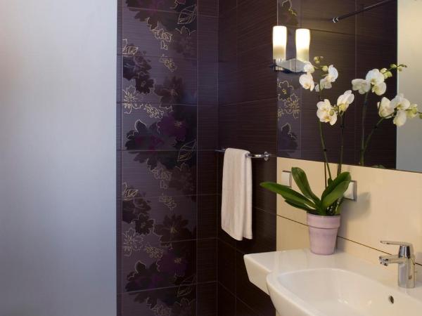 Hotel Metropol : photo 7 de la chambre chambre familiale (2 adultes et 2 enfants)