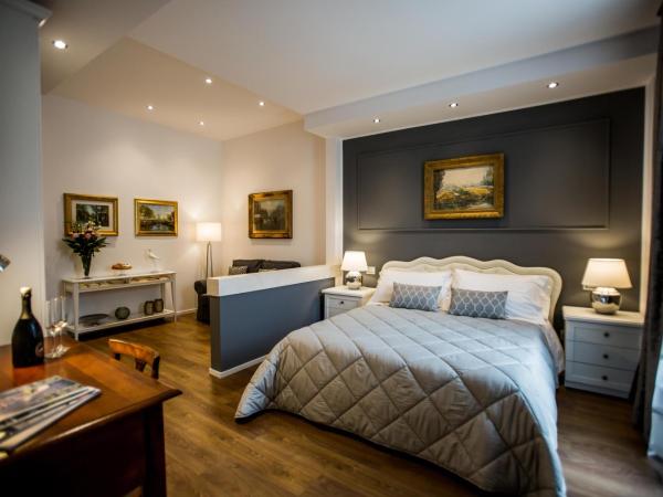 Arena Suite : photo 1 de la chambre suite supérieure avec balcon