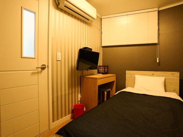 Mama Guesthouse Myeongdong : photo 8 de la chambre chambre simple avec salle de bains privative