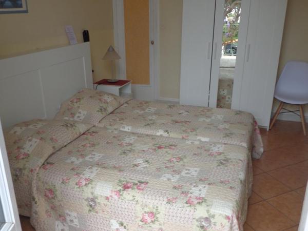 L'ilot Fleuri : photo 4 de la chambre chambre lits jumeaux - vue sur mer