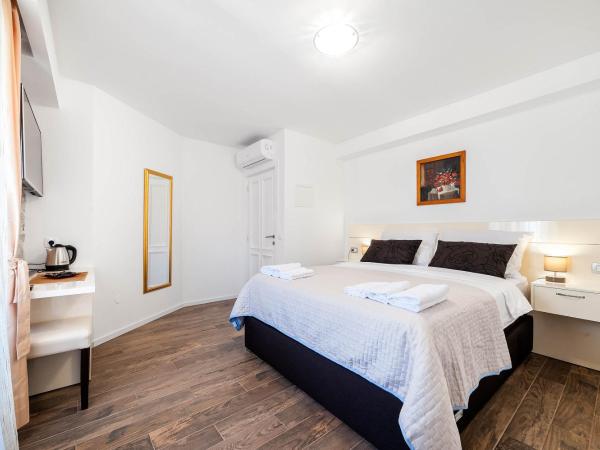 Apartments Palace Rialto : photo 3 de la chambre chambre lit king-size deluxe