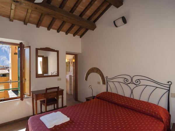 Helvetia Pisa Tower : photo 1 de la chambre chambre quadruple