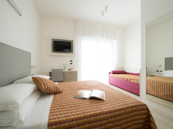 Hotel Pillon : photo 2 de la chambre chambre triple deluxe