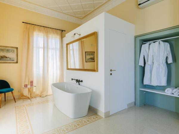 Dimora Archimedea : photo 6 de la chambre suite supérieure lit king-size