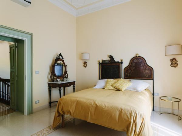 Dimora Archimedea : photo 9 de la chambre suite supérieure lit king-size