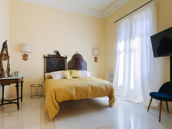 Dimora Archimedea : photo 10 de la chambre suite supérieure lit king-size