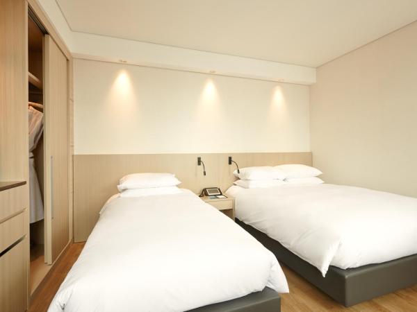 Mayplace Hotel : photo 3 de la chambre chambre lits jumeaux deluxe