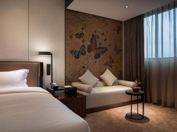 Paco Hotel Chebeinan Metro Guanghzou-Free Shuttle Bus For Canton Fair : photo 3 de la chambre chambre lit king-size premium