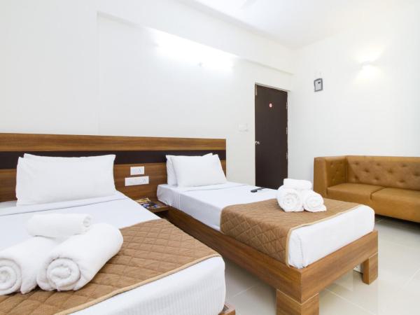 Sanctum Suites Whitefield Bangalore : photo 1 de la chambre chambre lits jumeaux supérieure