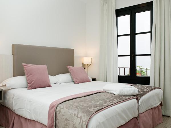 Suites La Posada De Pilar : photo 9 de la chambre appartement 2 chambres