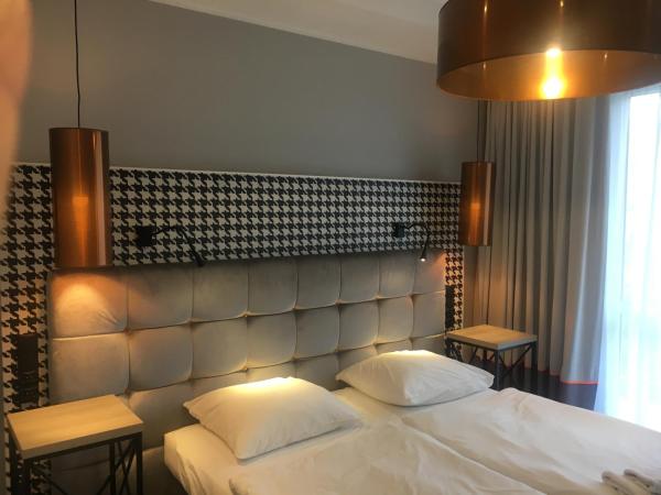 Hotel Pomarańczowa Plaża ex Bursztyn : photo 1 de la chambre chambre double avec balcon