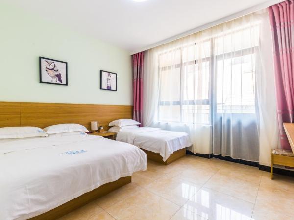 Sanya Passion fruit Inn : photo 2 de la chambre chambre familiale