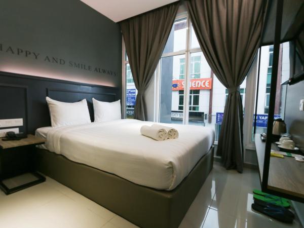 Hotel 99 Sri Petaling (Bukit Jalil) : photo 2 de la chambre chambre lit queen-size standard avec fenêtre