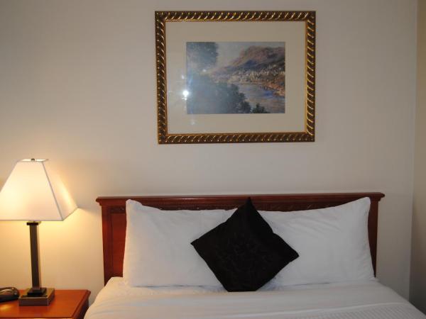 Economy Inn : photo 1 de la chambre suite lit queen-size – non-fumeurs