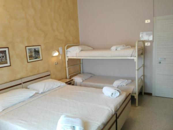 Hotel Marittimo : photo 1 de la chambre chambre quadruple