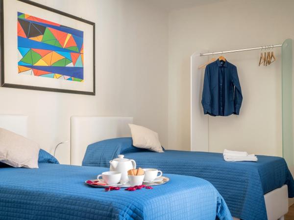 Plaium Montis : photo 4 de la chambre chambre double ou lits jumeaux avec salle de bains privative externe