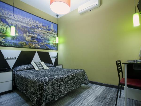 JC Rooms Santa Ana : photo 2 de la chambre chambre double ou lits jumeaux