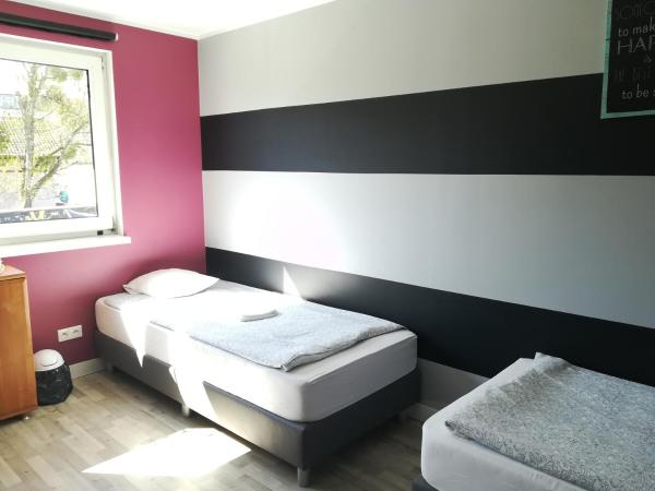 Tetris Sopot : photo 3 de la chambre chambre quadruple avec salle de bains privative séparée