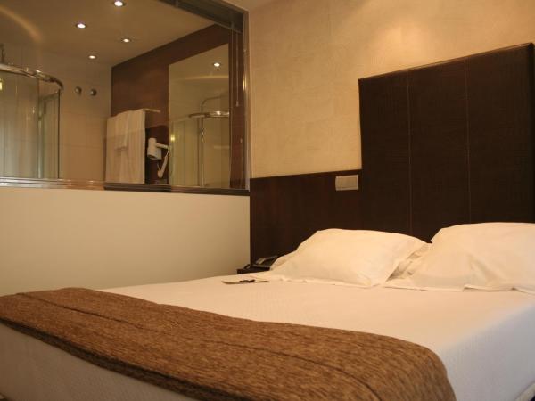 Hotel Alda San Carlos : photo 3 de la chambre grande chambre simple