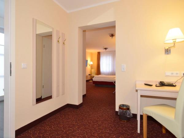 Hotel Behrmann : photo 4 de la chambre chambre quadruple