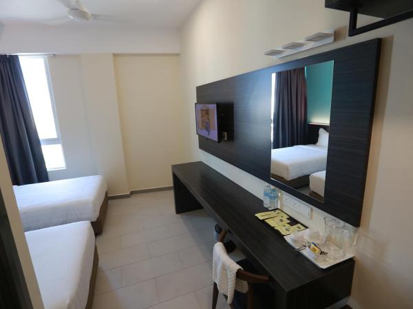 Pantai Regal Boutique Hotel : photo 4 de la chambre chambre lits jumeaux deluxe