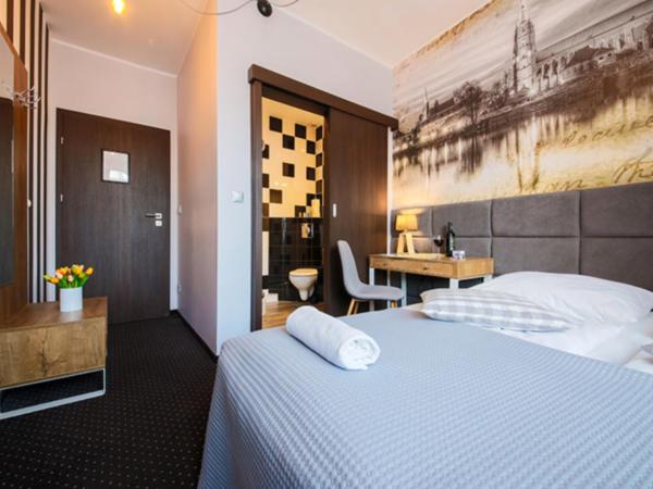 Boogie ApartHouse Old Town : photo 8 de la chambre chambre double ou lits jumeaux avec salle de bains privative