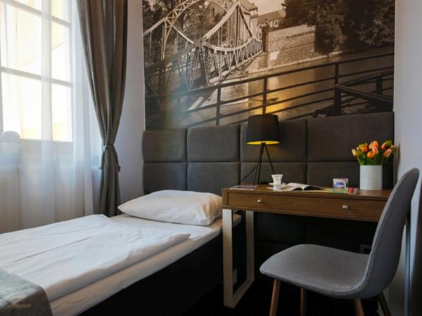 Boogie ApartHouse Old Town : photo 3 de la chambre chambre simple avec salle de bains privative