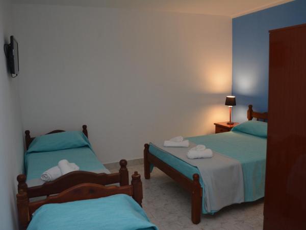 Hotel Isella : photo 10 de la chambre chambre quadruple de luxe