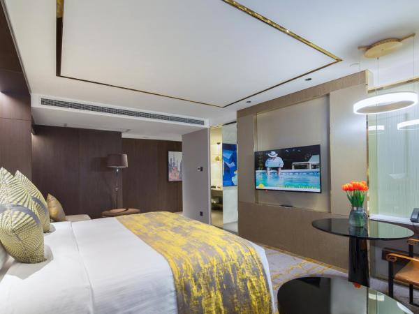 Golden Tulip Shanghai Hongqiao - A Louvre Hotel : photo 1 de la chambre chambre lit king-size exécutive